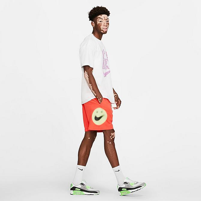 Front view of Men's Nike Sportswear World Tour Shorts in Turf Orange Click to zoom