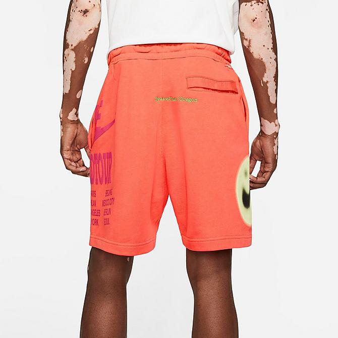 Back Right view of Men's Nike Sportswear World Tour Shorts in Turf Orange Click to zoom