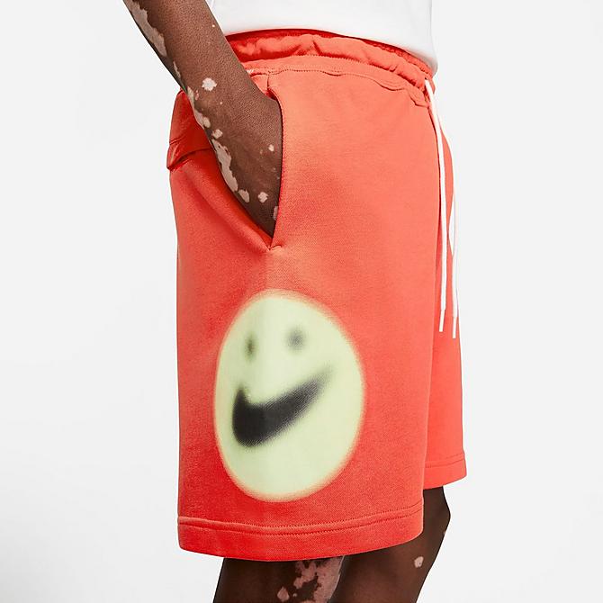 On Model 5 view of Men's Nike Sportswear World Tour Shorts in Turf Orange Click to zoom