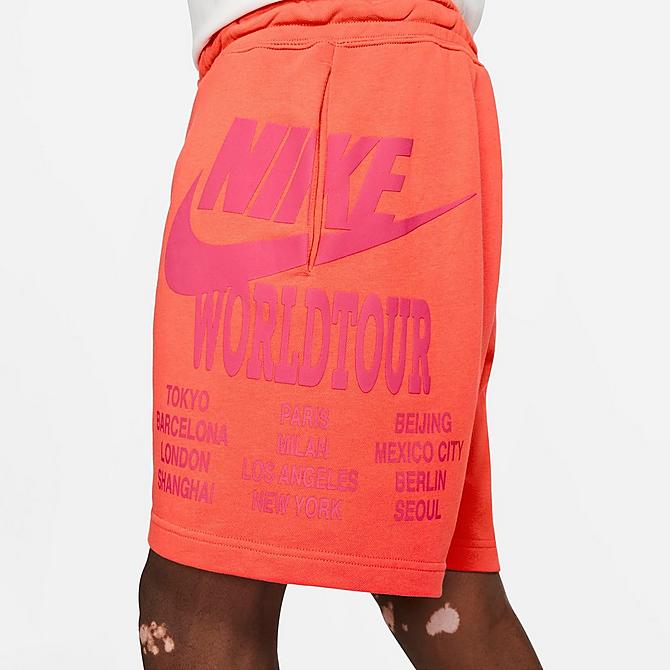 On Model 6 view of Men's Nike Sportswear World Tour Shorts in Turf Orange Click to zoom