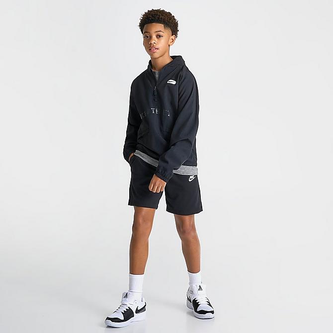 Front Three Quarter view of Boys' Nike Sportswear Jersey Shorts in Black/White/White Click to zoom