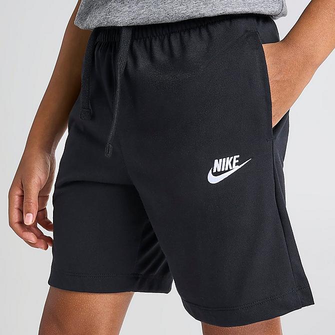 On Model 5 view of Boys' Nike Sportswear Jersey Shorts in Black/White/White Click to zoom