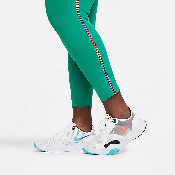 On Model 5 view of Women's Nike One Rainbow Ladder Mid-Rise Cropped Leggings in Neptune Green/White Click to zoom