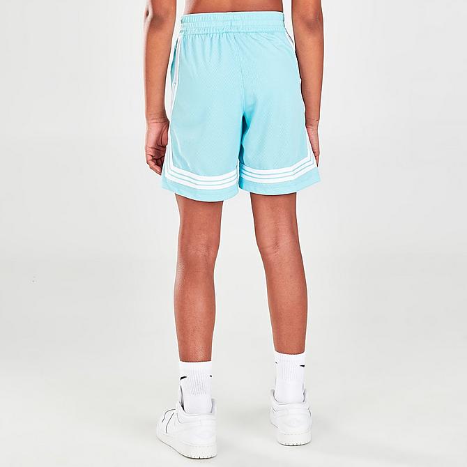 Back Right view of Girls' Nike Fly Crossover Training Shorts in Copa/White Click to zoom