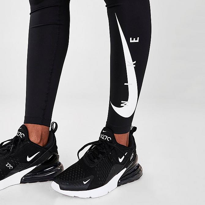 On Model 6 view of Women's Nike Swoosh Run Running Tights in Black/White Click to zoom