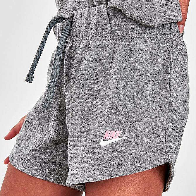 On Model 5 view of Girls' Nike Sportswear Jersey Shorts in Carbon Heather/Sunset Pulse Click to zoom