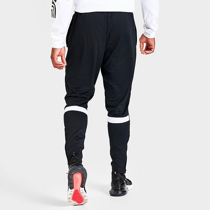 Back Right view of Men's Nike Dri-FIT Academy Open Swoosh Training Pants in Black/White/White Click to zoom
