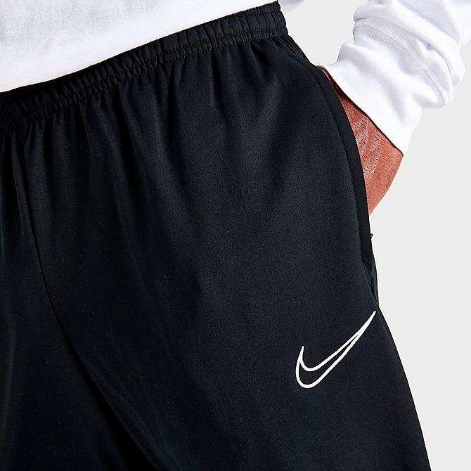 On Model 5 view of Men's Nike Dri-FIT Academy Open Swoosh Training Pants in Black/White/White Click to zoom