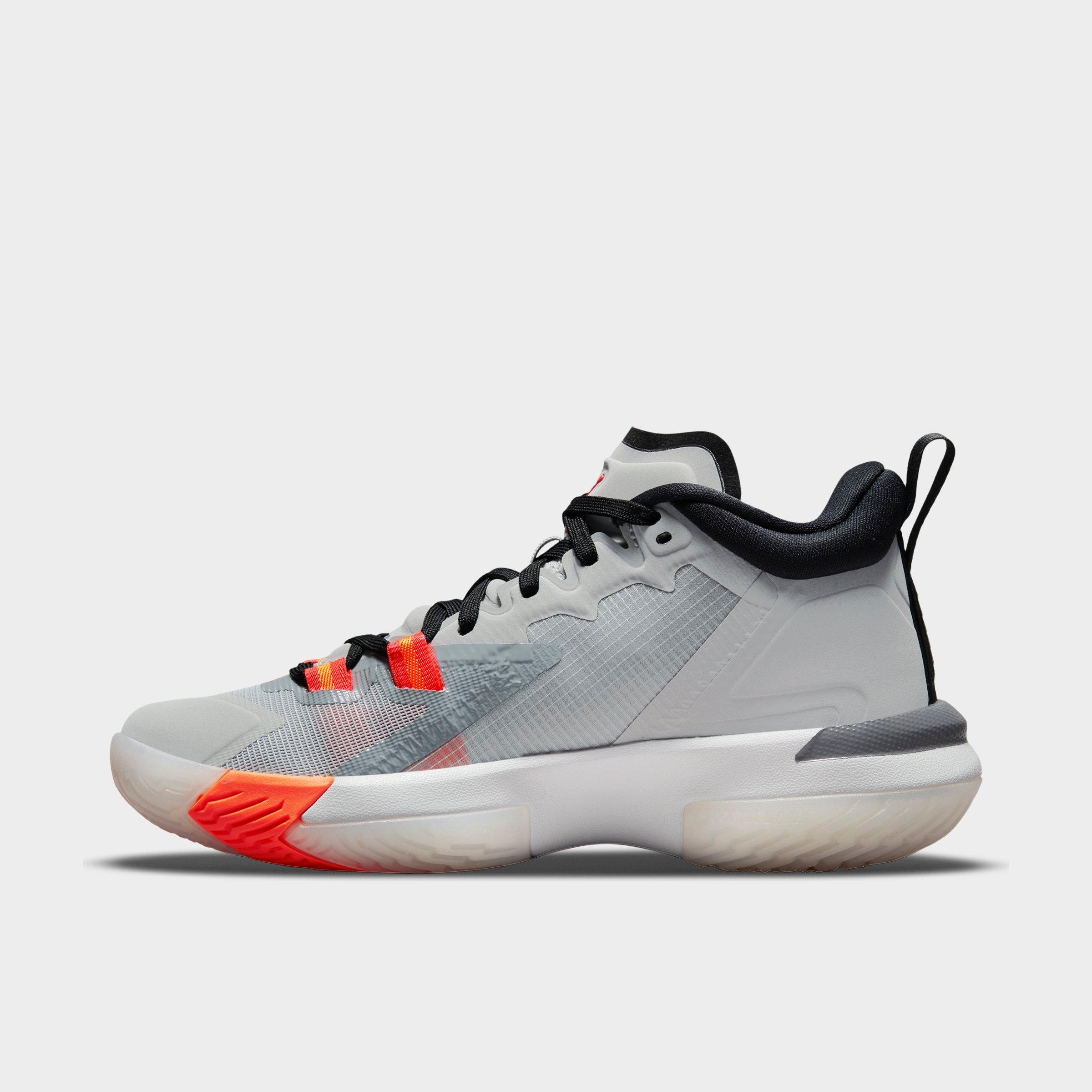 grey and orange basketball shoes