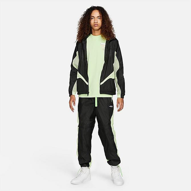 Front Three Quarter view of Men's Jordan 23 Engineered Mesh Hit Track Jacket in Black/Light Liquid Lime/Electric Green Click to zoom