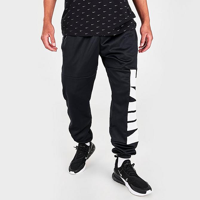 Front Three Quarter view of Nike Therma-FIT Starting 5 Basketball Jogger Pants in Black/White Click to zoom