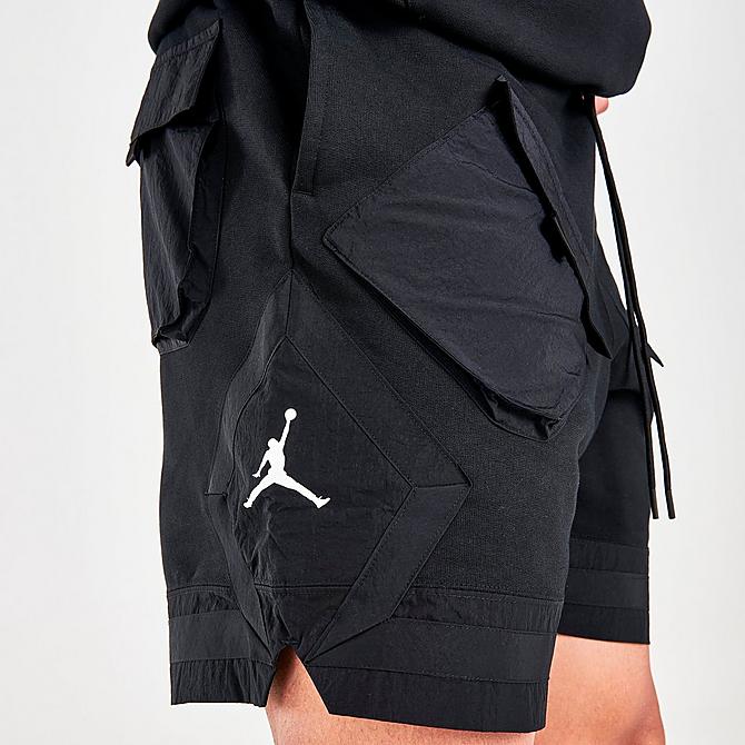 On Model 5 view of Men's Jordan 23 Engineered Fleece Shorts in Black/Black/White Click to zoom