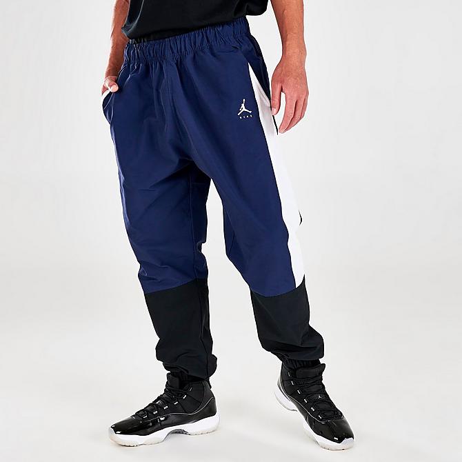 Front Three Quarter view of Men's Jordan Jumpman Woven Pants in Midnight Navy/White/Black Click to zoom