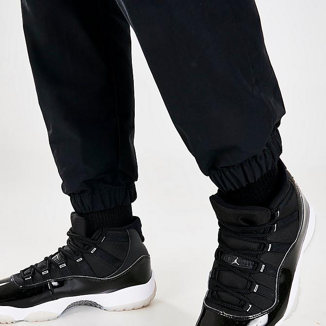 On Model 6 view of Men's Jordan Jumpman Woven Pants in Midnight Navy/White/Black Click to zoom