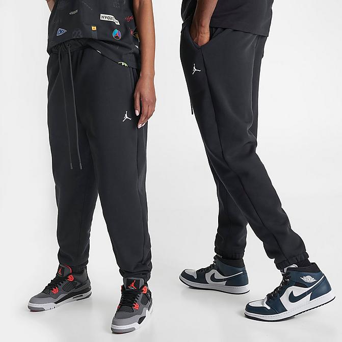 Front view of Men's Jordan Essentials Fleece Pants in Black Click to zoom
