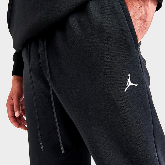 On Model 5 view of Men's Jordan Essentials Fleece Pants in Black Click to zoom