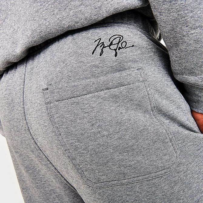 On Model 6 view of Men's Jordan Essentials Fleece Pants in Carbon Heather Click to zoom