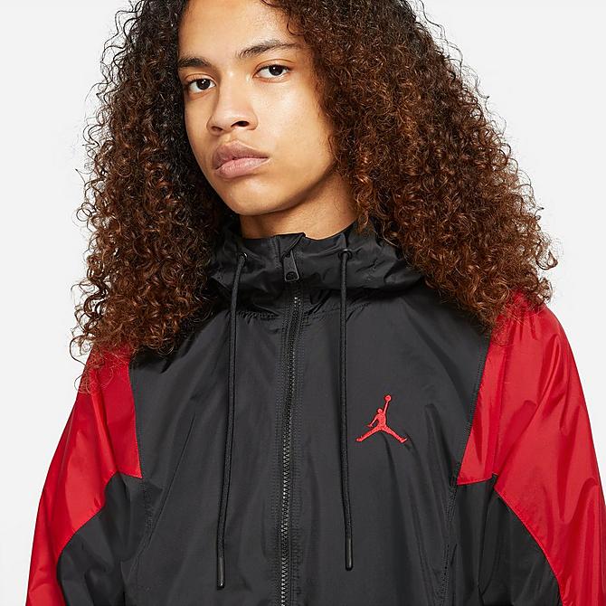 Back Right view of Men's Jordan Essentials Woven Jacket in Black/Gym Red Click to zoom