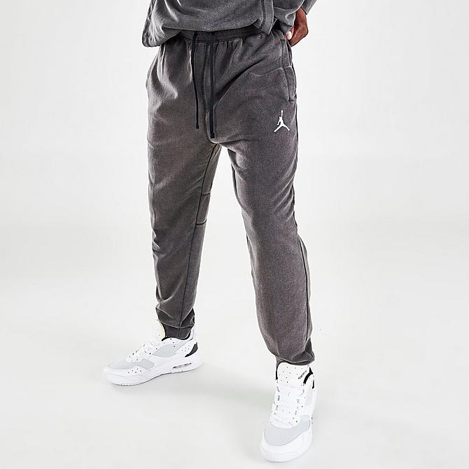 Front Three Quarter view of Men's Jordan Dri-FIT Air Fleece Pants in Black/White Click to zoom