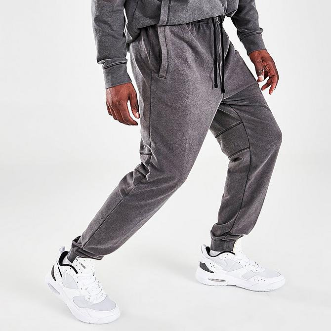 Back Left view of Men's Jordan Dri-FIT Air Fleece Pants in Black/White Click to zoom