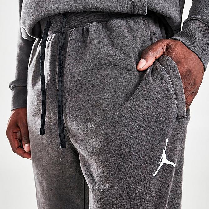 On Model 5 view of Men's Jordan Dri-FIT Air Fleece Pants in Black/White Click to zoom