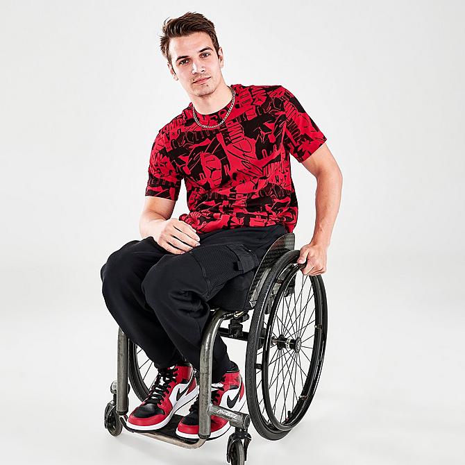 Front Three Quarter view of Men's Jordan Jumpman Flight All-Over Printed T-Shirt in Black/Gym Red Click to zoom