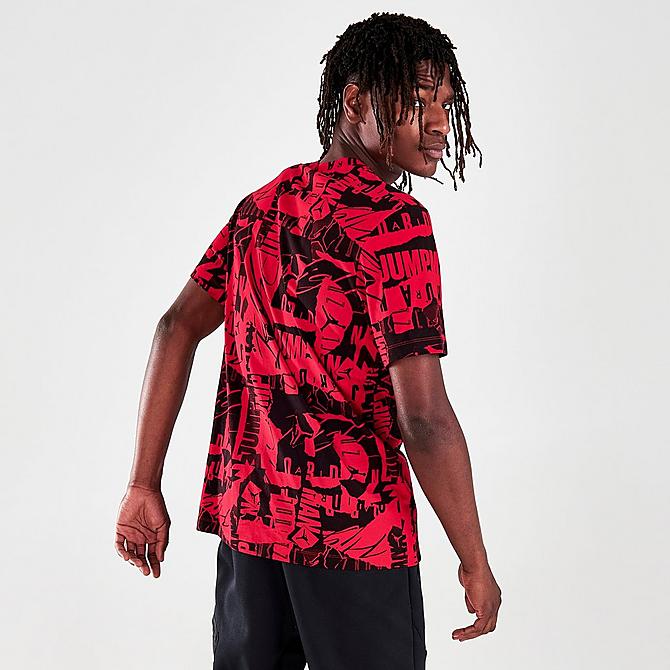 On Model 5 view of Men's Jordan Jumpman Flight All-Over Printed T-Shirt in Black/Gym Red Click to zoom