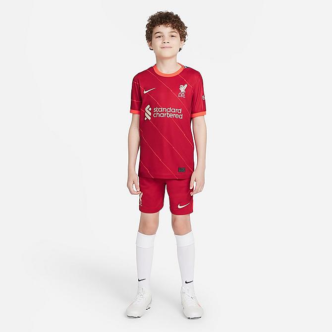 Back Left view of Kids' Nike Liverpool FC 2021/22 Stadium Home Soccer Jersey in Gym Red/Bright Crimson/Fossil Click to zoom