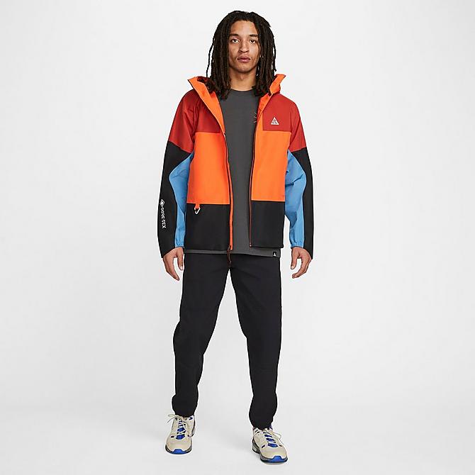 Back Left view of Men's Nike Storm-FIT ADV ACG "Chain of Craters" Hiking Jacket in Rush Orange/Black/Summit White Click to zoom