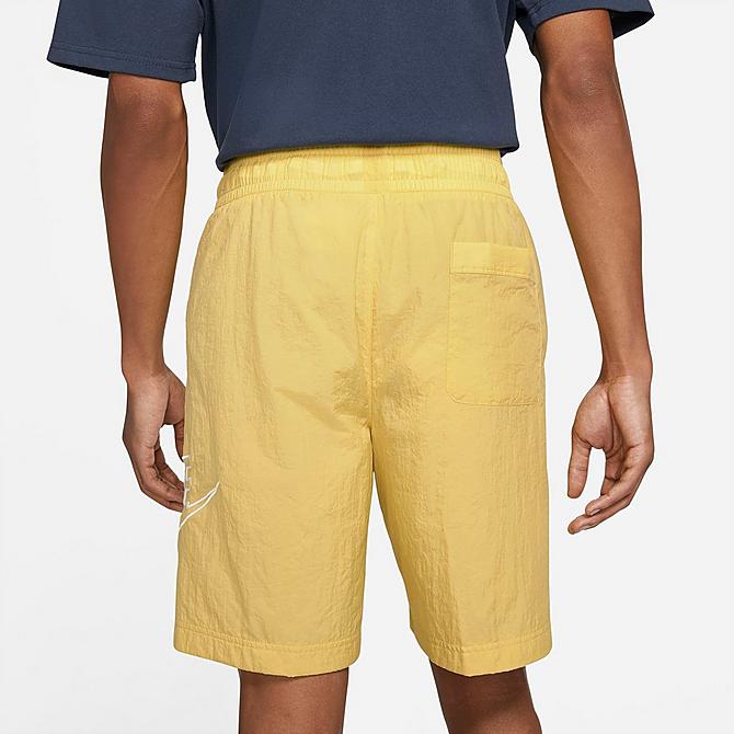 Front Three Quarter view of Men's Nike Sportswear Alumni Woven Shorts in Saturn Gold Click to zoom