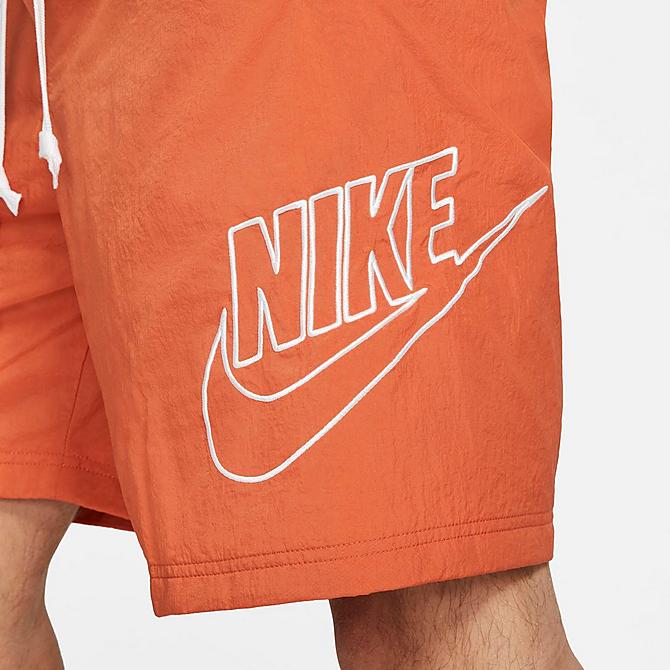 On Model 6 view of Men's Nike Sportswear Alumni Woven Shorts in Light Sienna Click to zoom