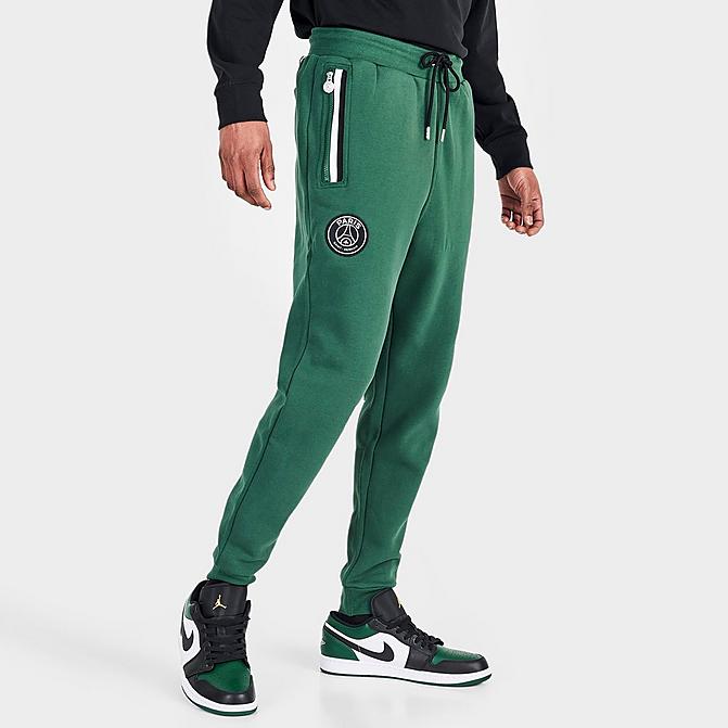 Front view of Men's Jordan Paris Saint-Germain Statement Fleece Track Pants in Noble Green Click to zoom