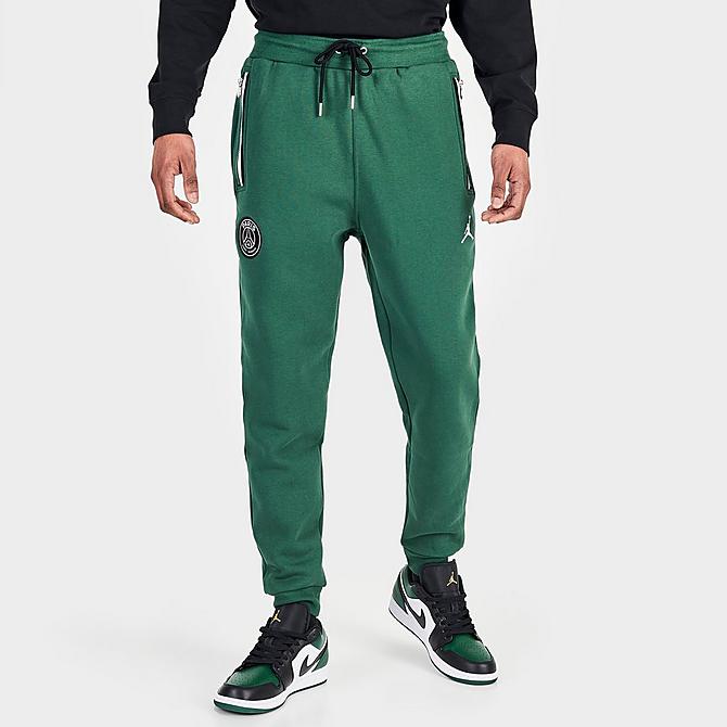 Back Left view of Men's Jordan Paris Saint-Germain Statement Fleece Track Pants in Noble Green Click to zoom