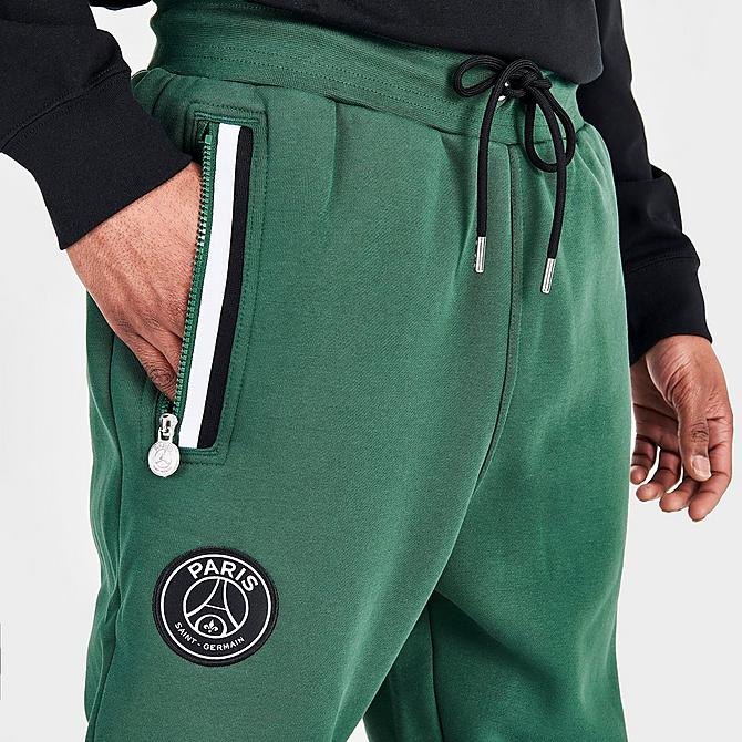 On Model 6 view of Men's Jordan Paris Saint-Germain Statement Fleece Track Pants in Noble Green Click to zoom