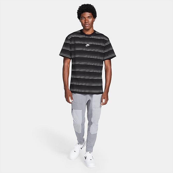 Front Three Quarter view of Men's Nike Sportswear Premium Essential Striped T-Shirt in Black Click to zoom