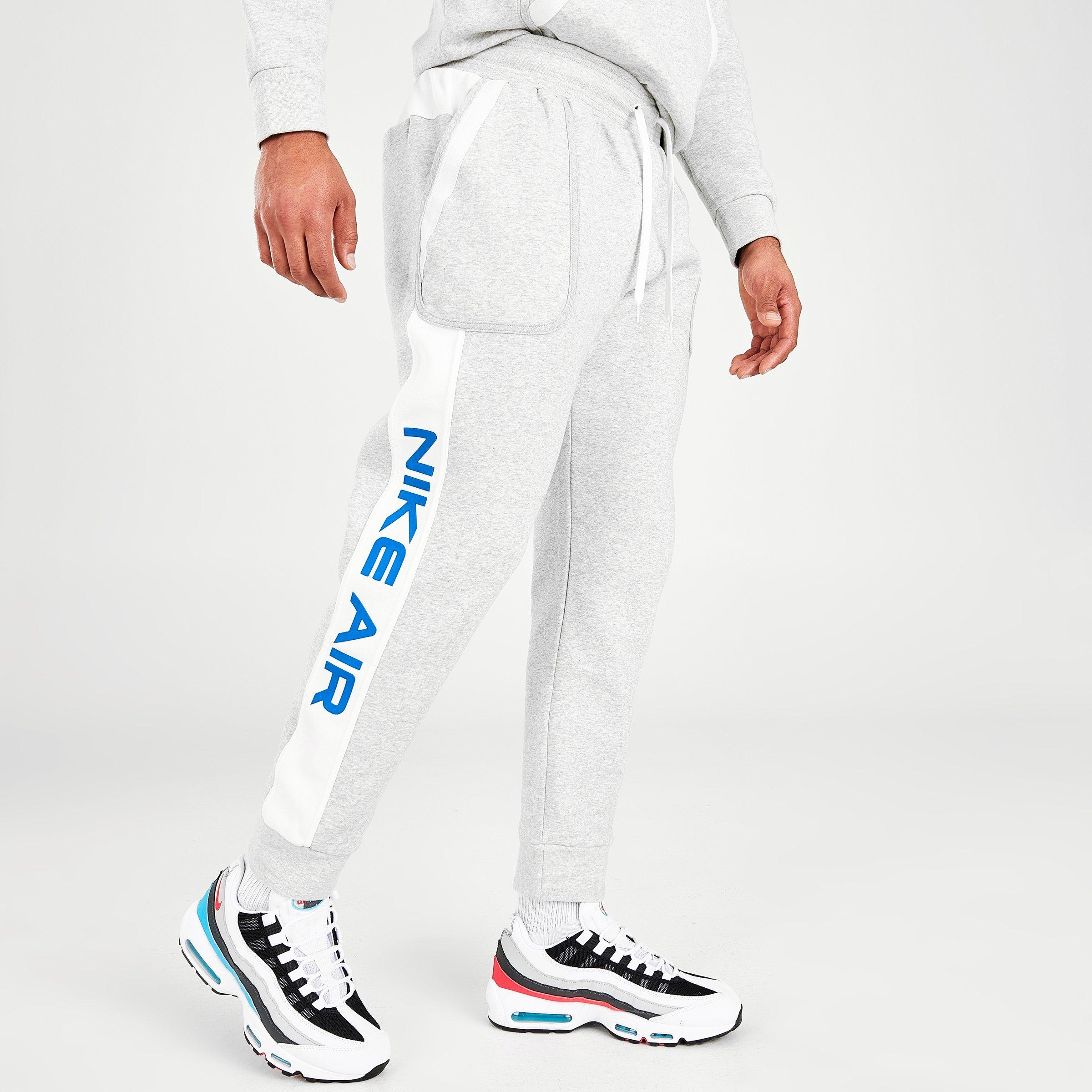 grey nike joggers with side pockets