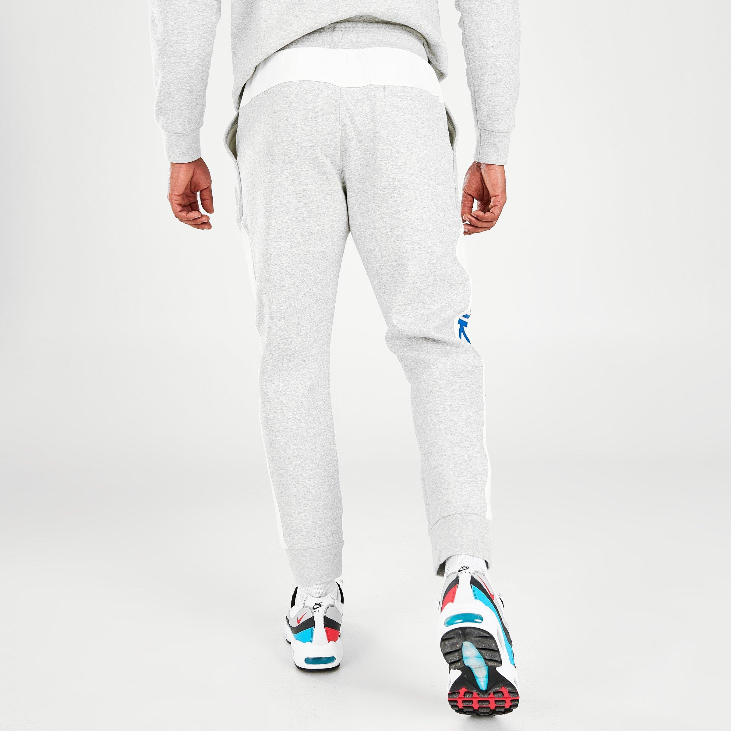 grey nike joggers with side pockets