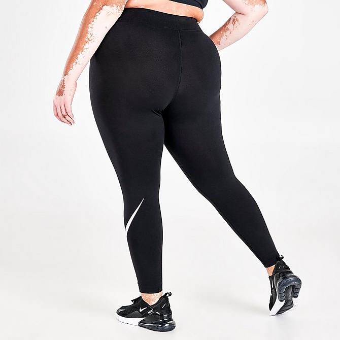 Back Right view of Women's Nike Sportswear Essential Mid-Rise Cropped Swoosh Leggings (Plus Size) in Black/White Click to zoom