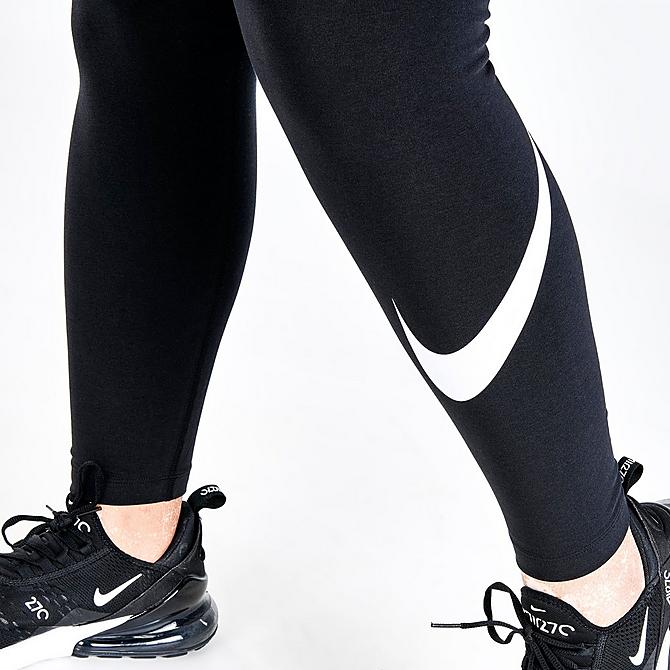 On Model 6 view of Women's Nike Sportswear Essential Mid-Rise Cropped Swoosh Leggings (Plus Size) in Black/White Click to zoom