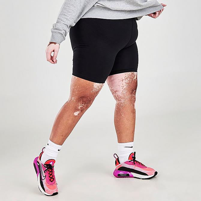 Front Three Quarter view of Women's Nike Sportswear Essential Mid-Rise Bike Shorts (Plus Size) in Black/White Click to zoom