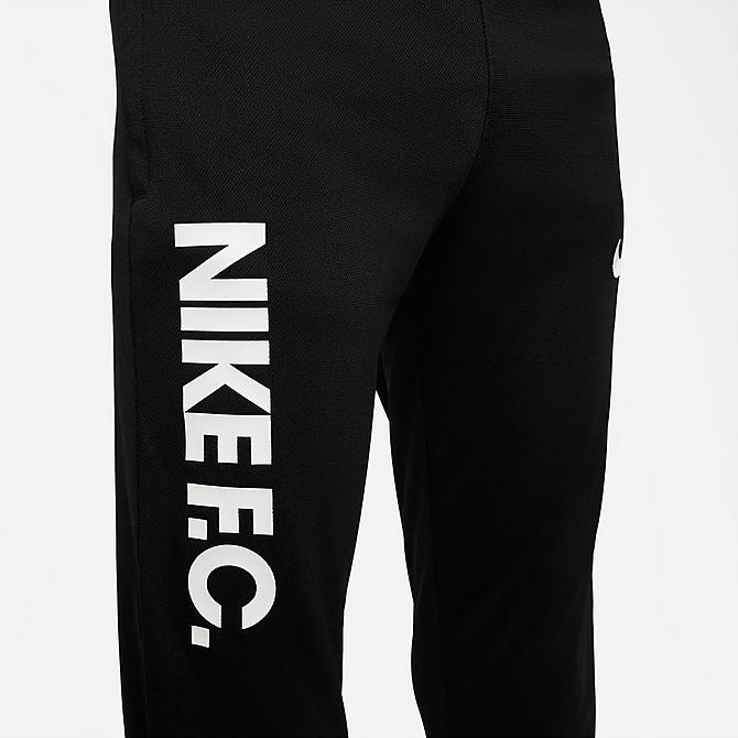 On Model 5 view of Boys' Nike F.C. Dri-FIT Knit Soccer Jogger Pants in Black/White/White Click to zoom