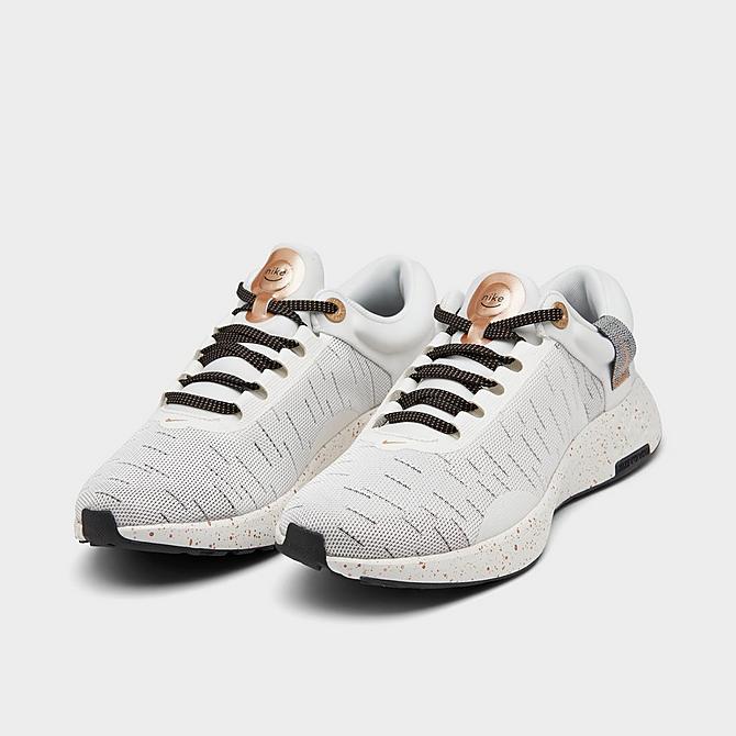 Three Quarter view of Women's Nike Renew Serenity Run Premium Road Running Shoes in Sail/Metallic Copper Coin/Black Click to zoom