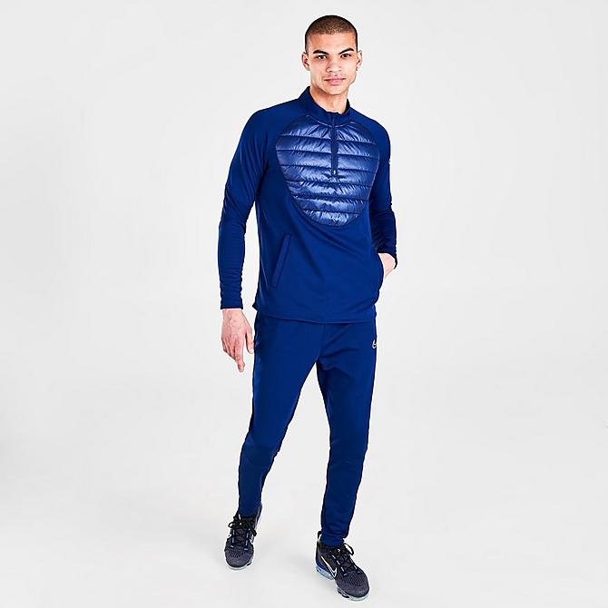 Front Three Quarter view of Men's Nike Therma-FIT Academy Winter Warrior Soccer Drill Top in Blue Void Click to zoom
