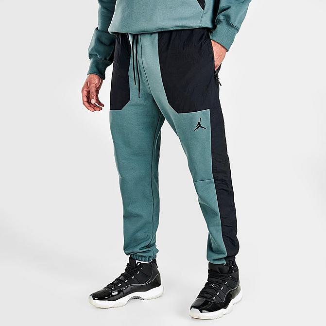 Front view of Men's Jordan 23 Engineered Fleece Pants in Hasta/Black/Black Click to zoom