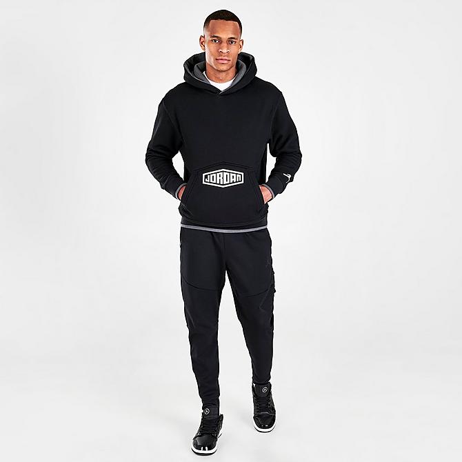Front Three Quarter view of Men's Jordan Sport DNA Pullover Hoodie in Black/Iron Grey/White Click to zoom