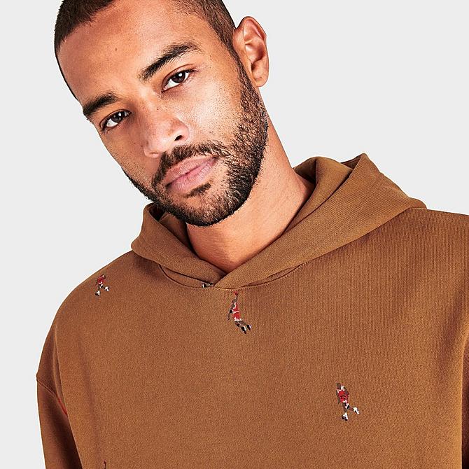 On Model 5 view of Men's Jordan Essentials Fleece Pullover Hoodie in Desert Bronze Click to zoom