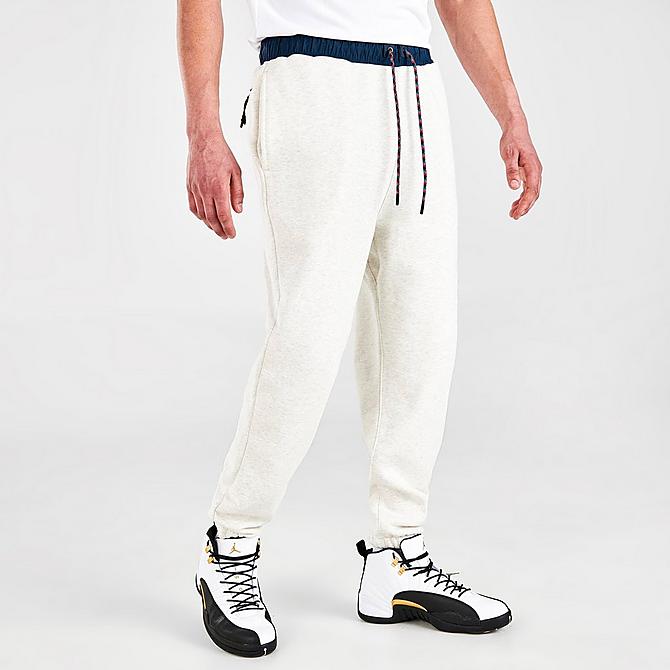 Back Left view of Men's Jordan Essentials Mountainside Graphic Pants in Oatmeal Heather Click to zoom