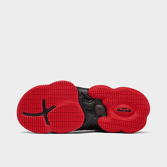 Bottom view of Big Kids' Nike LeBron 19 Basketball Shoes in Black/Black/University Red Click to zoom