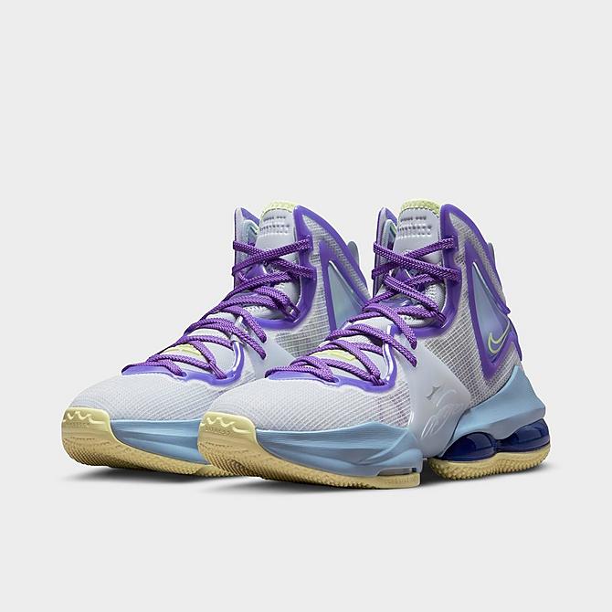 Three Quarter view of Big Kids' Nike LeBron 19 Basketball Shoes in Aura/Citron Tint/Worn Blue/Psychic Purple Click to zoom