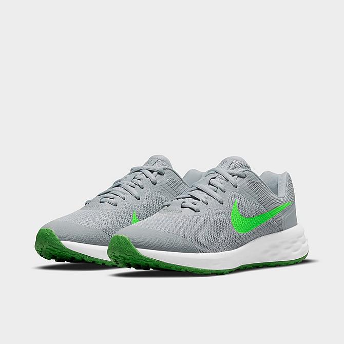 Three Quarter view of Big Kids' Nike Revolution 6 Running Shoes in Light Smoke Grey/Green Strike/Dark Smoke Grey/Chrome Click to zoom